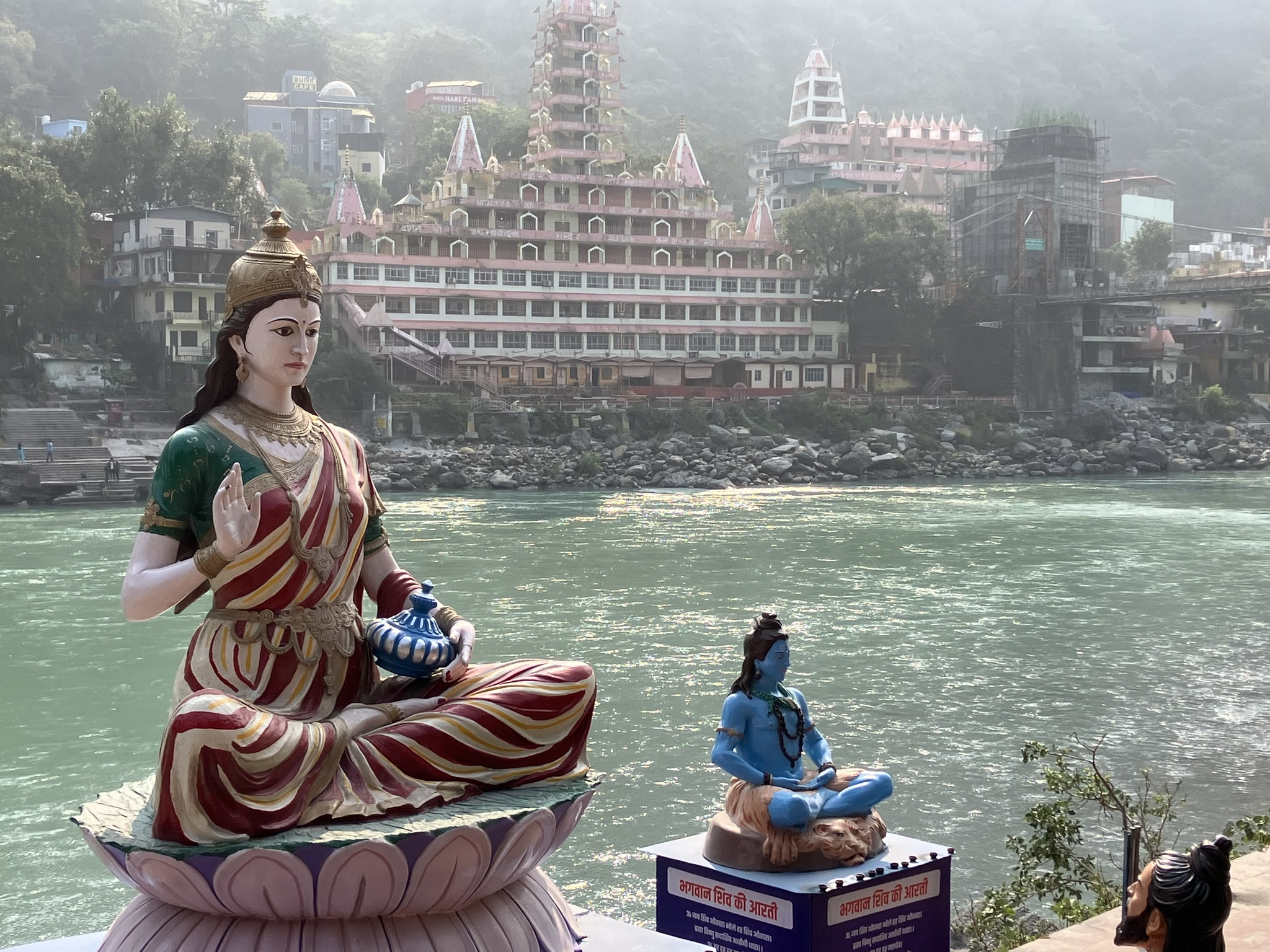A Goddess idol in front of the Ganges river