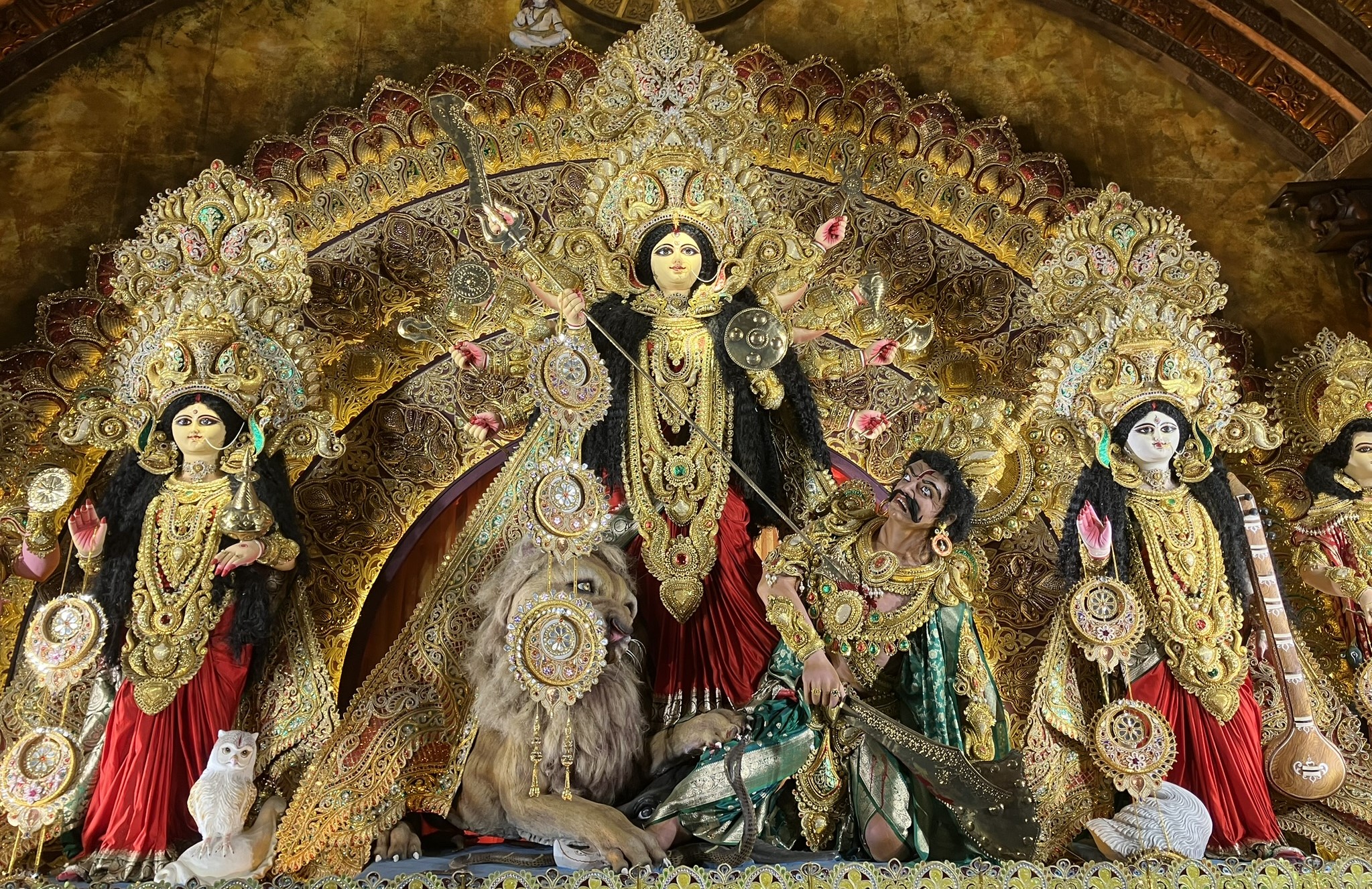 Ornate golden idol of the Goddess Maa Durga.